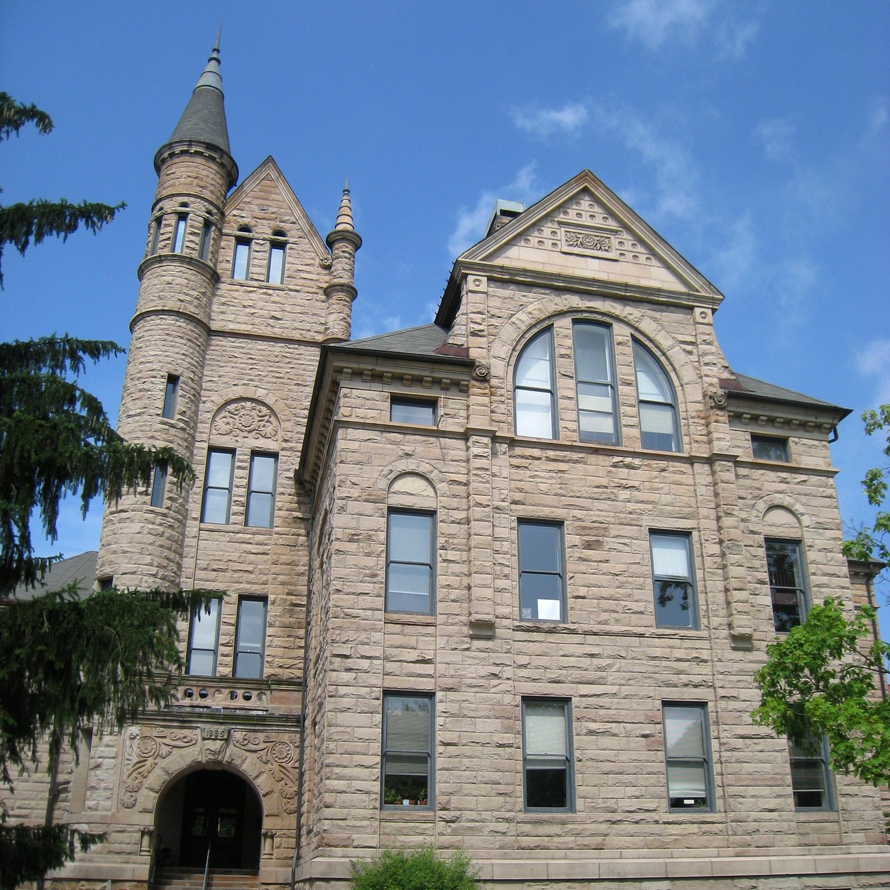 Peters Hall, a historic sandstone building with a turret, on the Oberlin College campus in Oberlin, Ohio